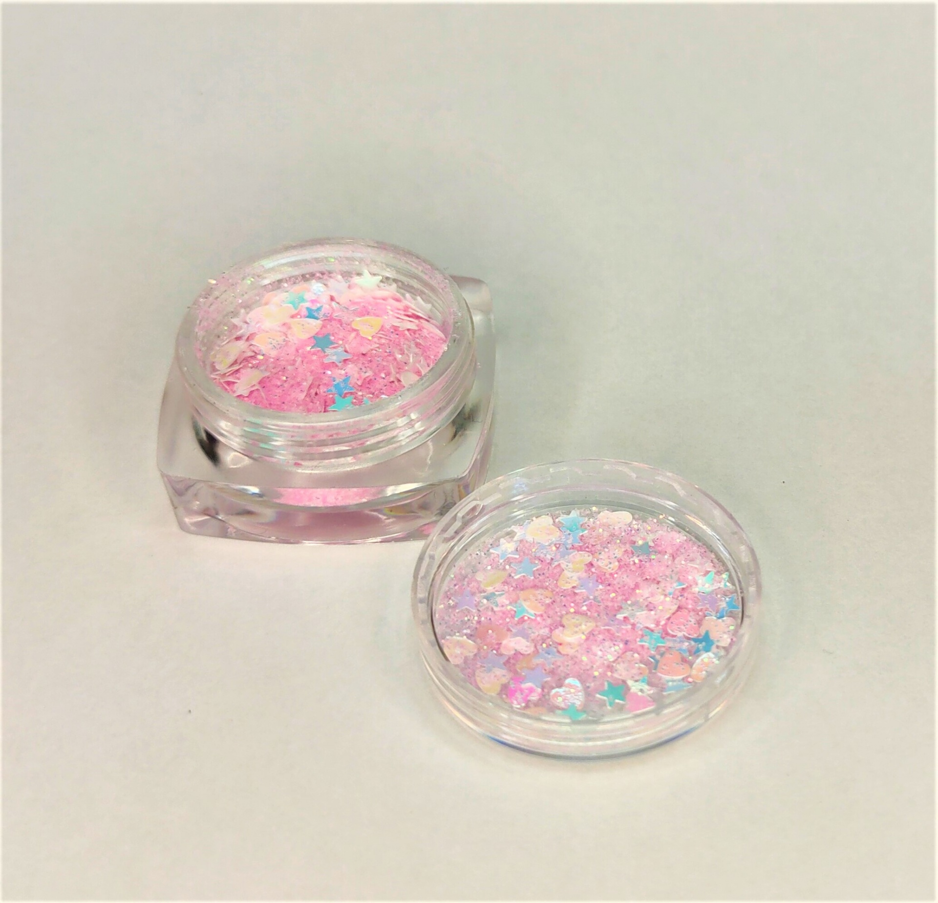 pó decorativo colorido em frasco transparente