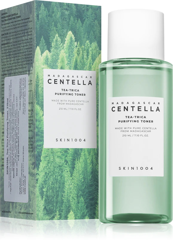 Frasco verde translúcido com toner e caixa com estampa de floresta verde