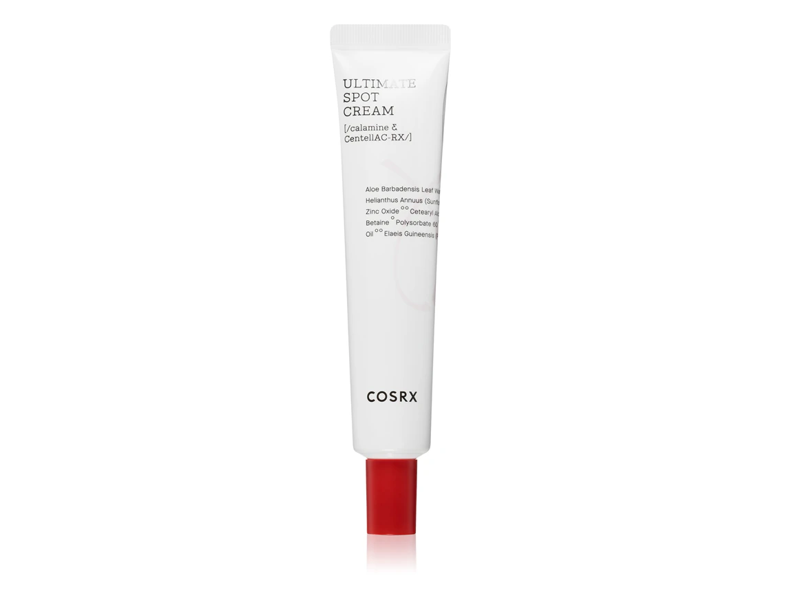 tubo branco de creme com tampa vermelha e texto preto