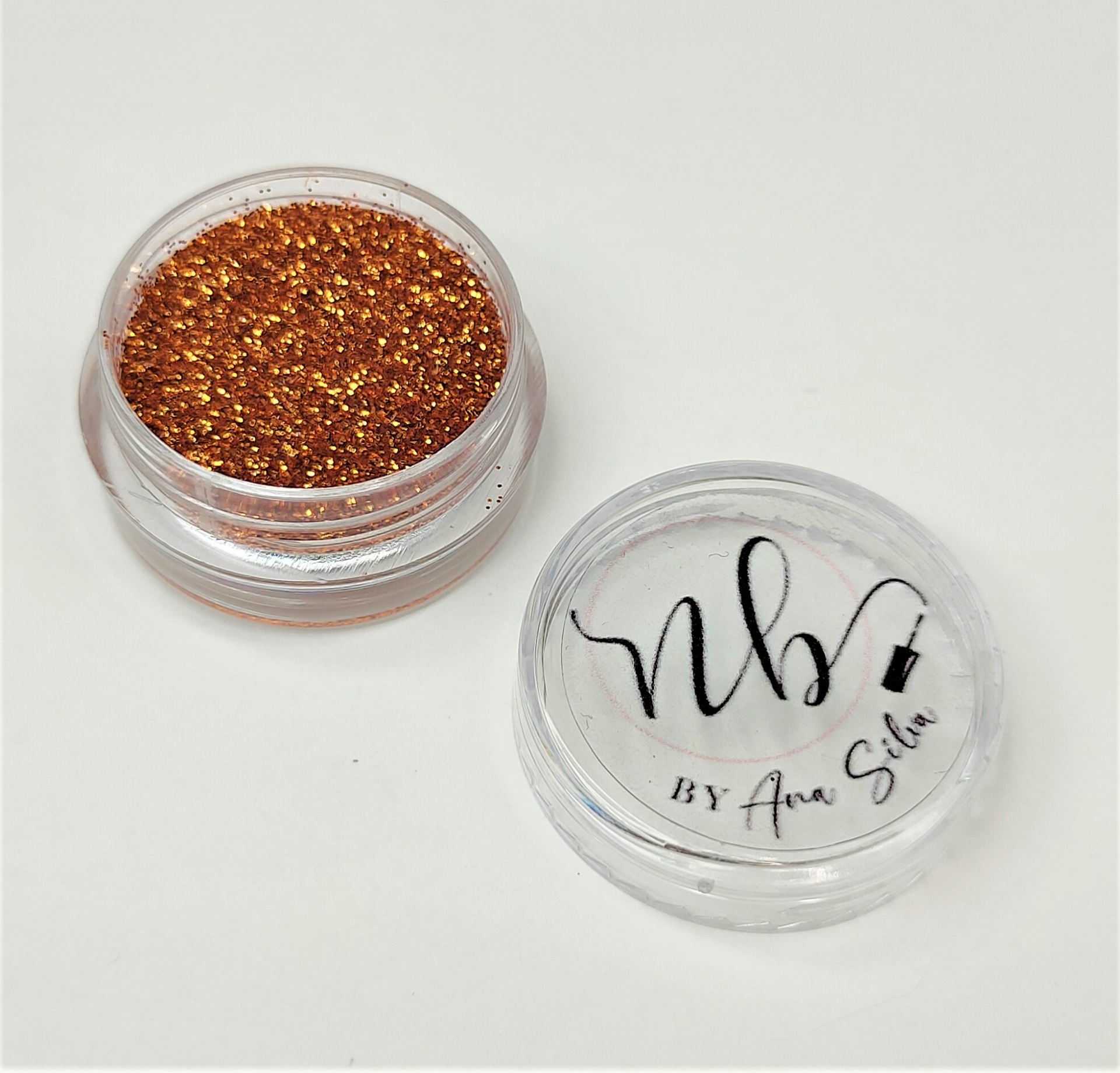 Pote transparente com glitter laranja e tampa com texto