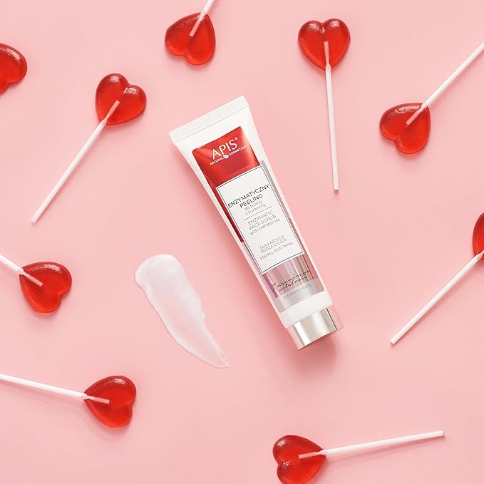 Tubo de creme APIS NATURAL SCIENCE + PEELING com pirulitos vermelhos em forma de coração ao redor