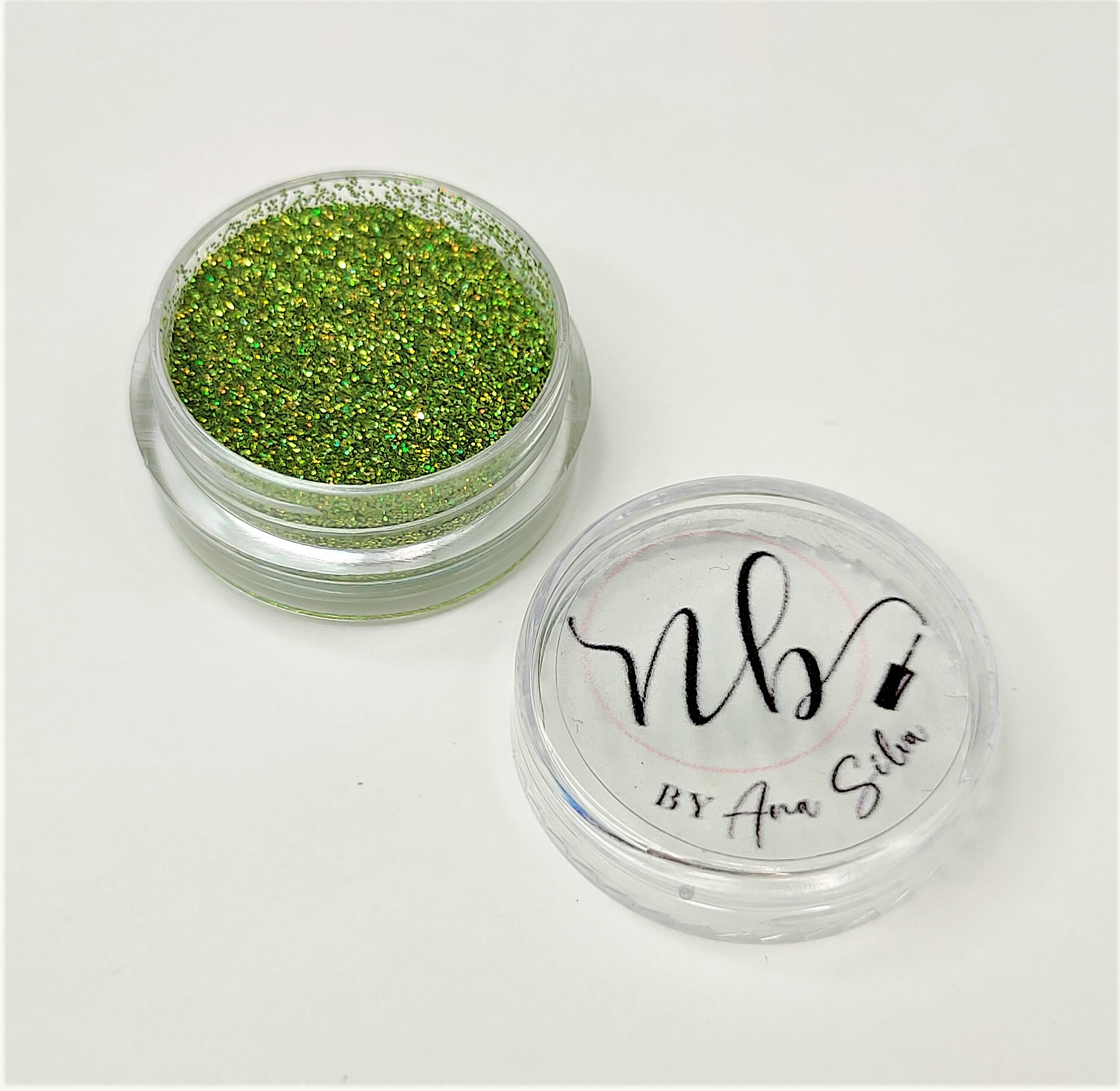 Pote transparente com glitter verde e tampa com texto nb BY Ana Silva
