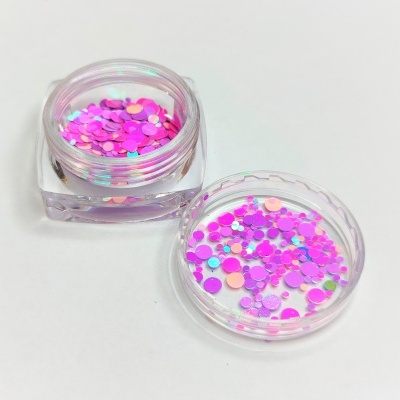Frasco pequeno com purpurina rosa e lilás brilhante aberto