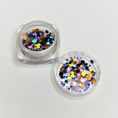 Dois frascos de purpurinas coloridas circulares em plástico transparente