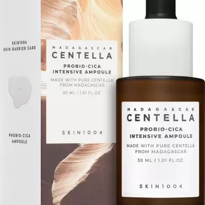 Frasco e caixa de sérum Madagascar Centella em vidro castanho e branco