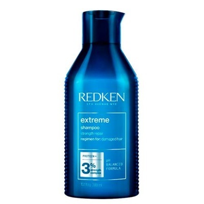 Frasco azul de shampoo REDKEN Extreme pH balanceado 3% proteína 300 ml