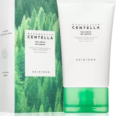 Tubo branco com tampa verde translúcida e caixa com padrão de árvores verdes do creme Madagascar Centella Tea-Trica B5 Cream da Skin1004