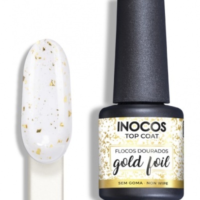 Verniz para unhas Inocos com flocos dourados em frasco preto e amostra em base branca