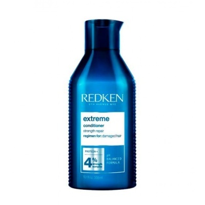 Frasco azul metálico de condicionador Redken Extreme 300 ml com rótulo branco e texto azul