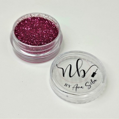 Pote de purpurina rosa com tampa rotulada NB BY Ana Silva