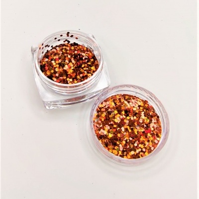 Dois recipientes transparentes com glitter colorido