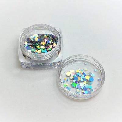 Frasco pequeno com lantejoulas coloridas variadas