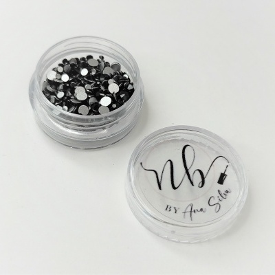 Recipientes transparentes com strass pretos e tampa assinada