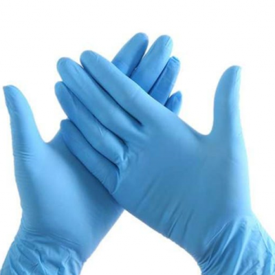 Par de luvas descartáveis azuis em fundo branco