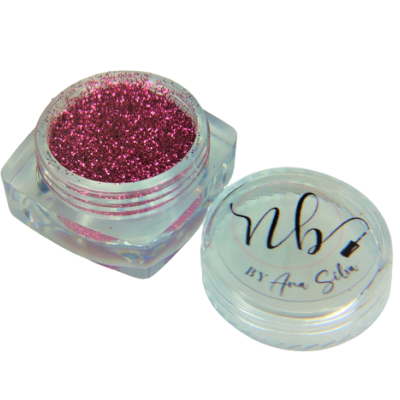 Pote pequeno transparente com glitter rosa brilhante e tampa com texto manuscrito.