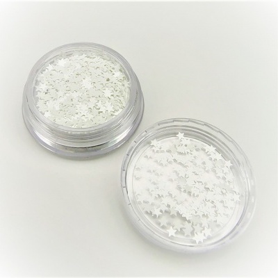 Duas caixas transparentes com glitter branco em forma de estrelas