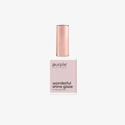 Frasco de verniz para unhas com tampa rosa dourado e rótulo cor de rosa