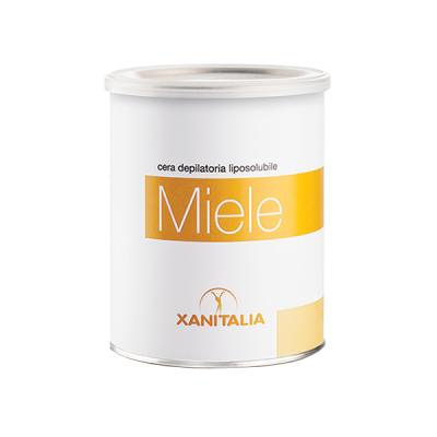Lata branca de cera depilatória com etiqueta amarela e texto Miele XANITALIA