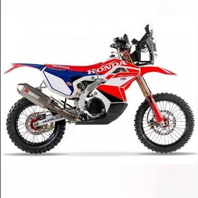 Motocicleta Honda de corrida com cores vermelho, branco e azul e pneus off-road