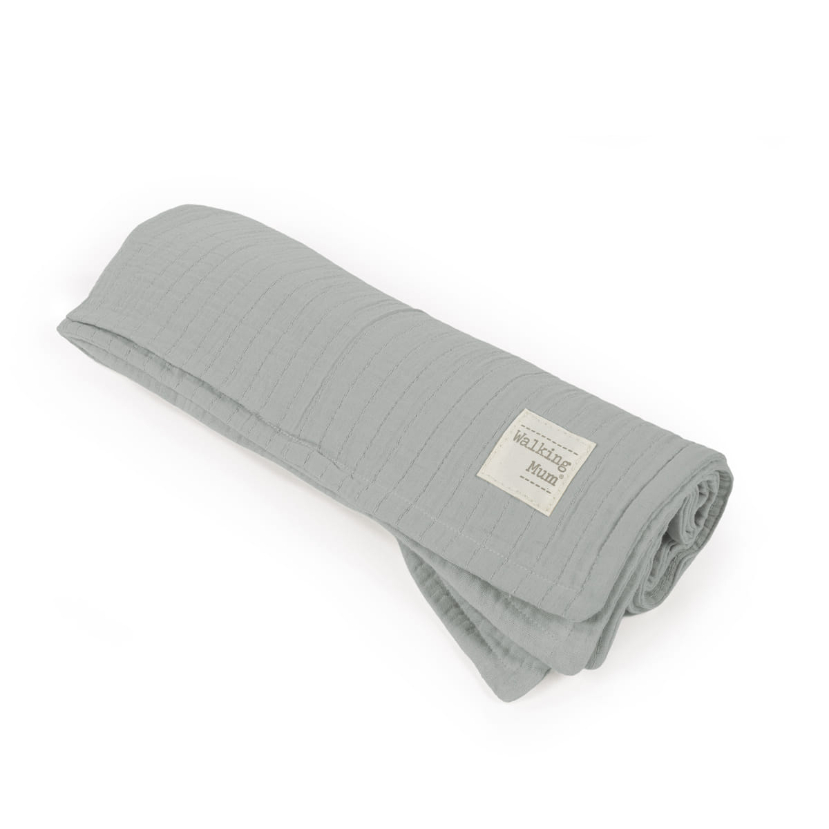 Manta cinzenta clara enrolada com etiqueta branca