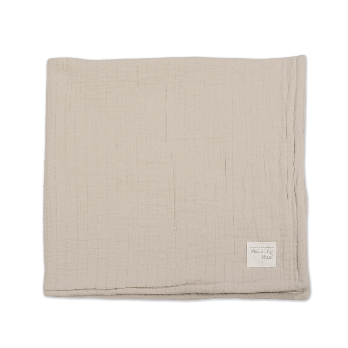 Manta bege com textura quadriculada e etiqueta branca