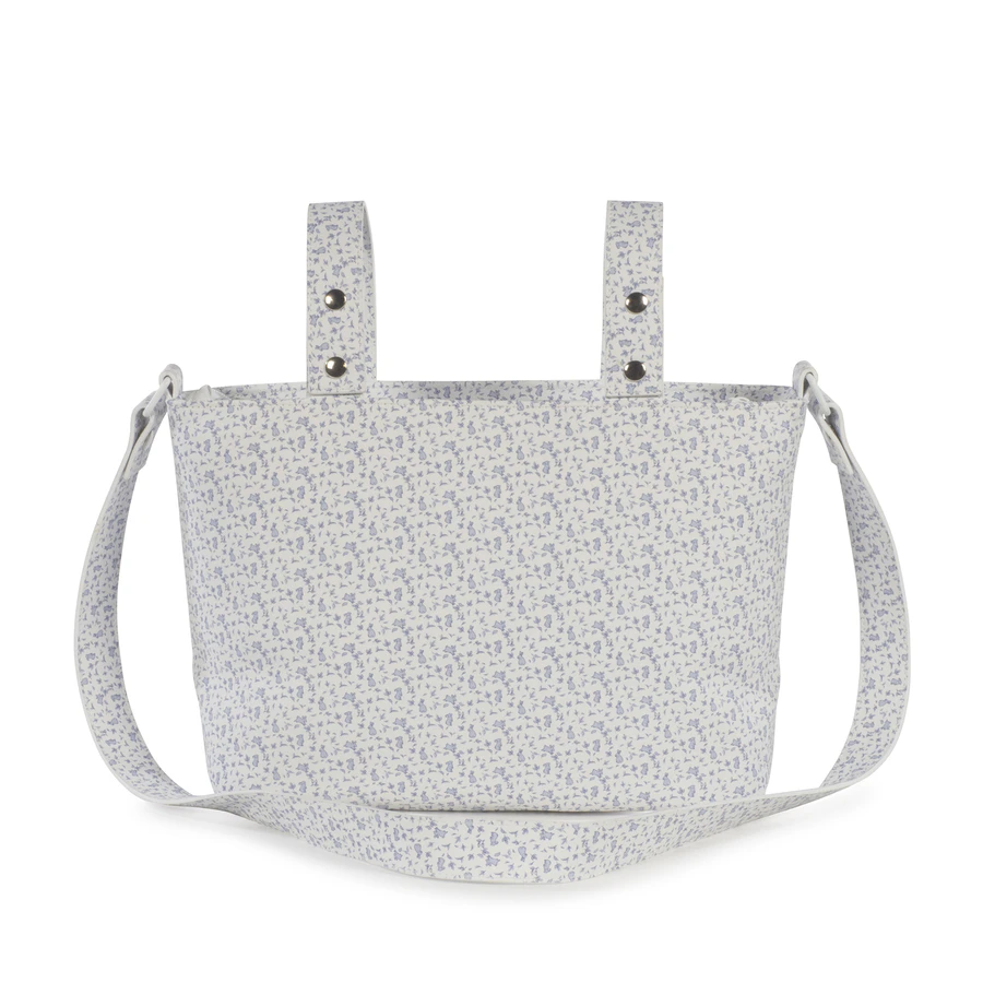 Bolsa de tecido branco com padrão floral lilás e alças ajustáveis