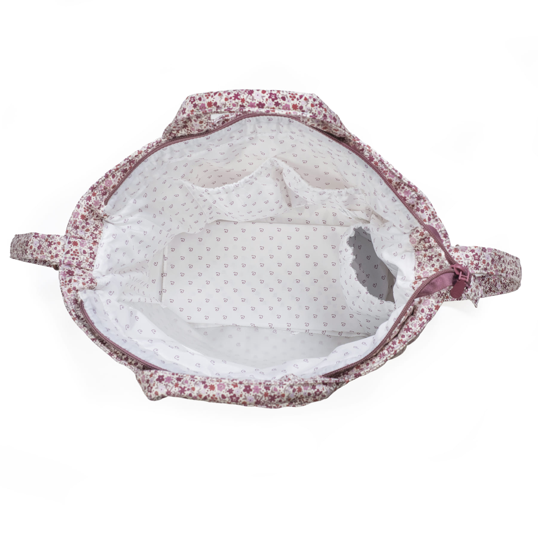 Bolsa de tecido com padrão floral e interior branco com pequenos desenhos