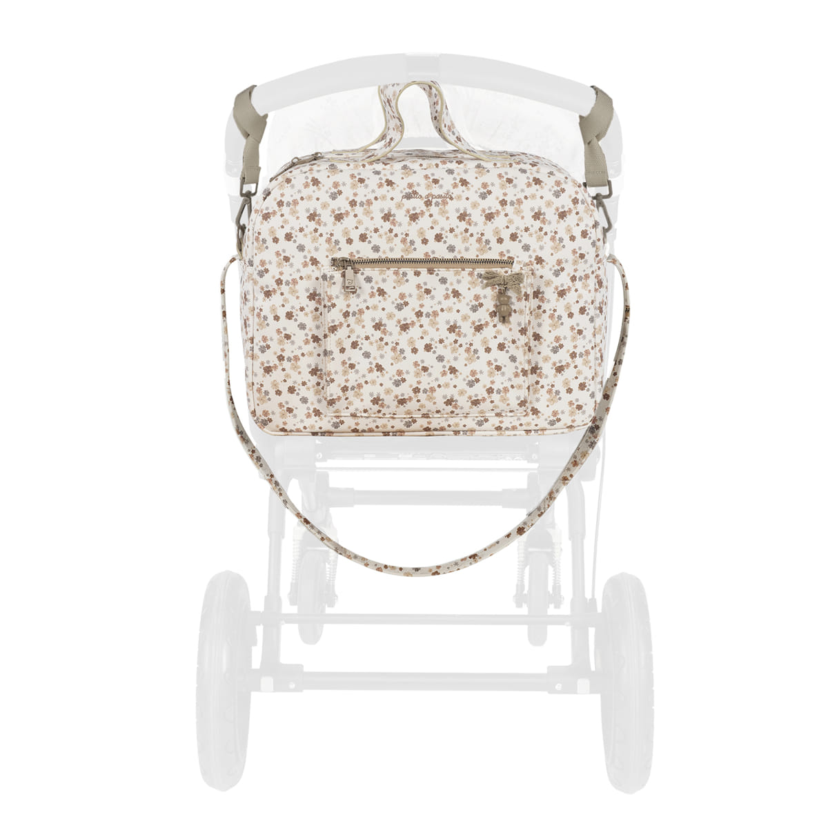 Bolsa de bebé floral com fecho num carrinho branco