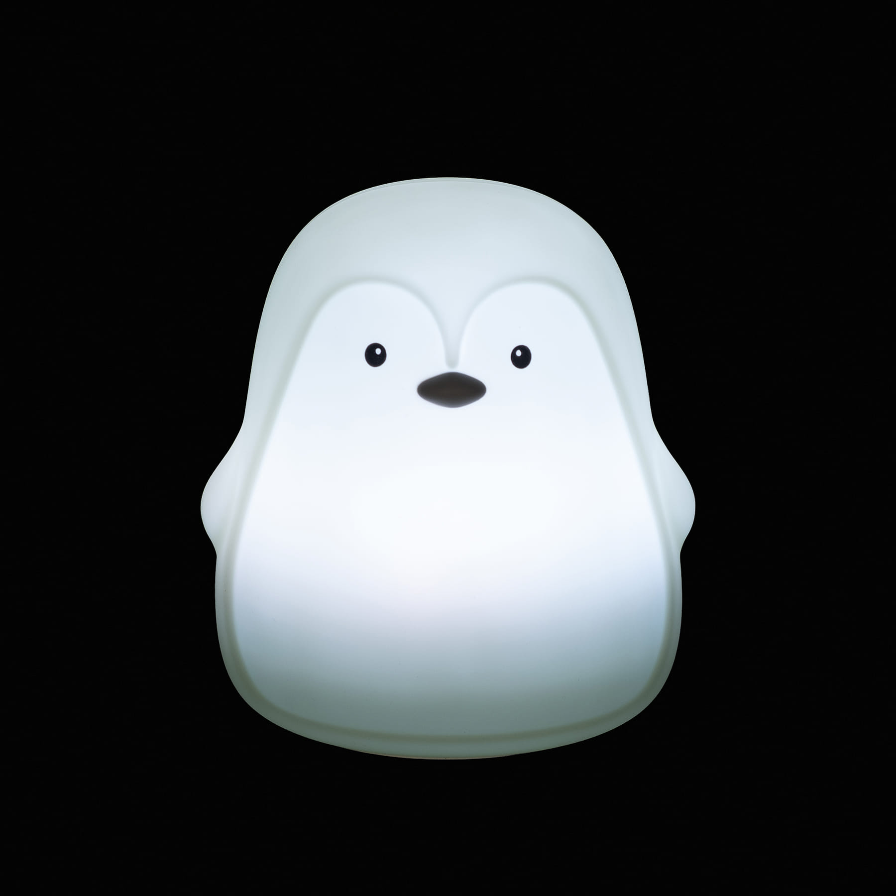 Luminária de pinguim branco iluminada