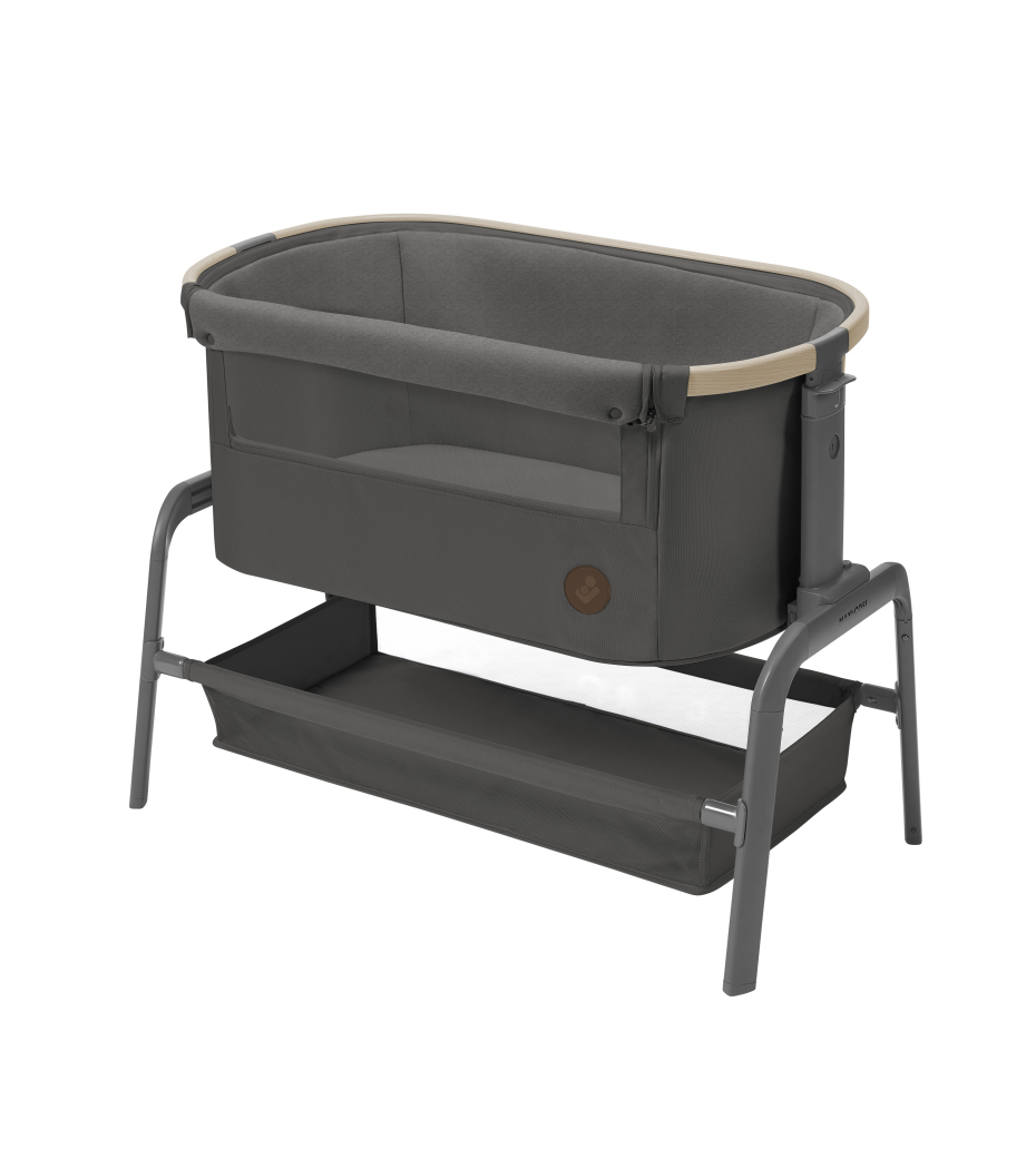 Berço de bebé cinzento com estrutura metálica e compartimento de armazenamento