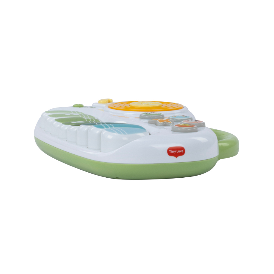 Brinquedo musical infantil branco e verde com teclas e botões coloridos