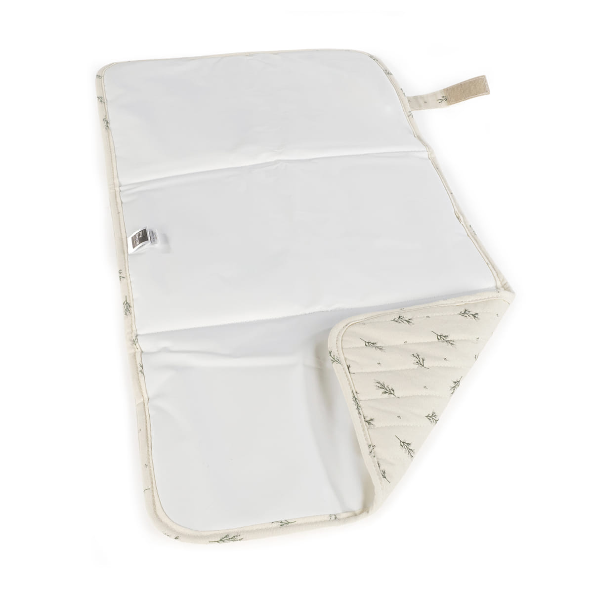 Trocador para bebé branco com padrão de folhas na parte inferior e bordas acolchoadas.
