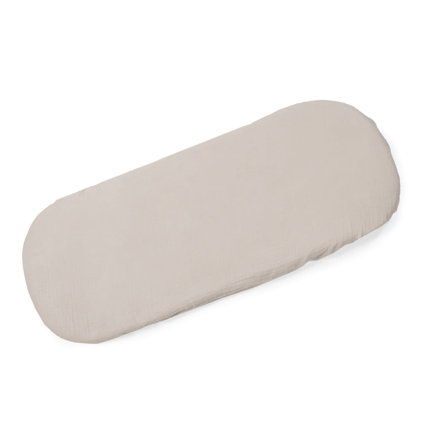 Colchão ou almofada bege clara com cantos arredondados