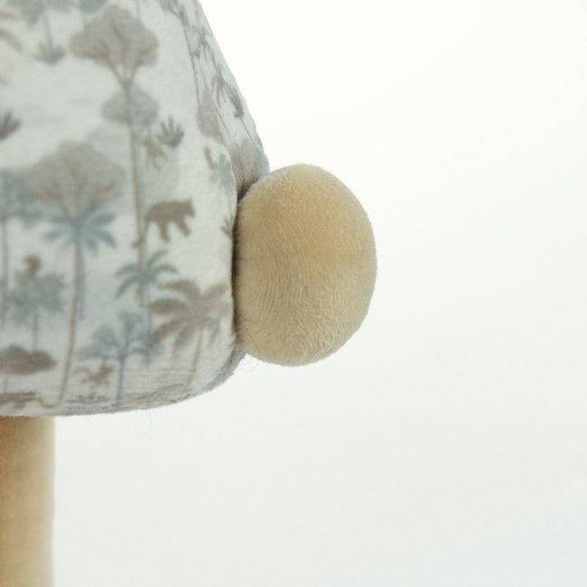 Estrutura com tecido estampado e bola de pelo bege