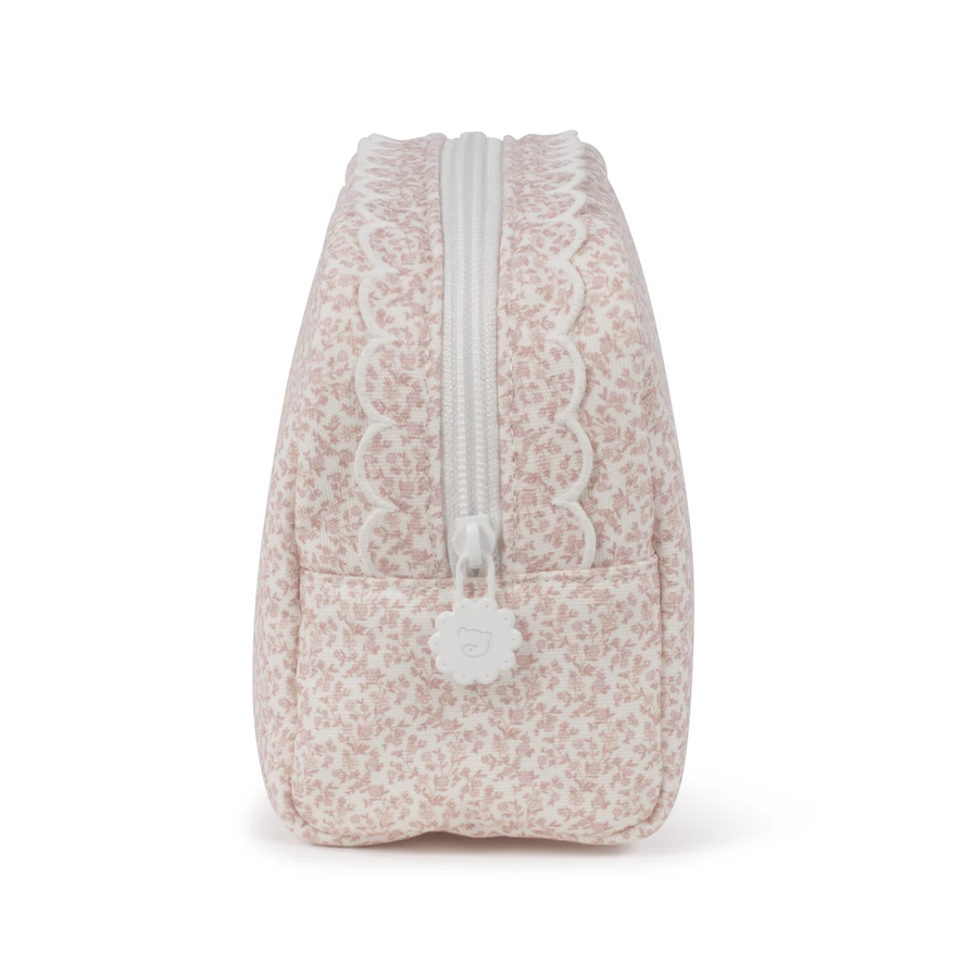 Bolsa pequena floral rosa claro com zíper branco vista lateral