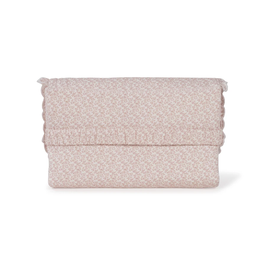Colcha rosa floral dobrada