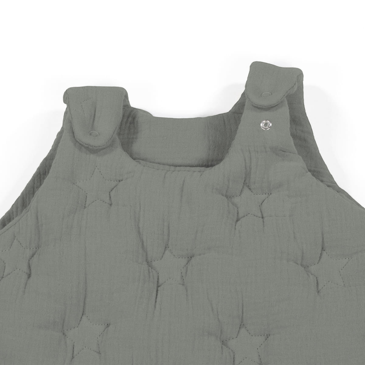 Macacão cinzento almofadado com padrão de estrelas em relevo e dois botões na alça