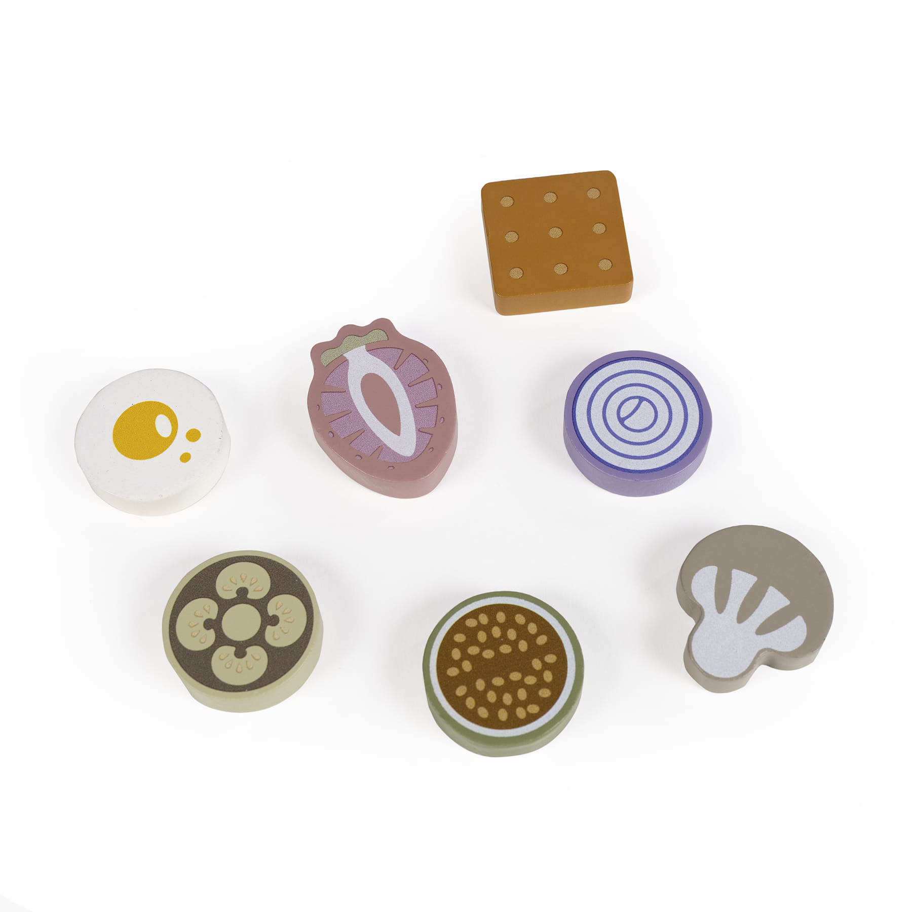 Peças de madeira colorida representando alimentos variados sobre fundo branco
