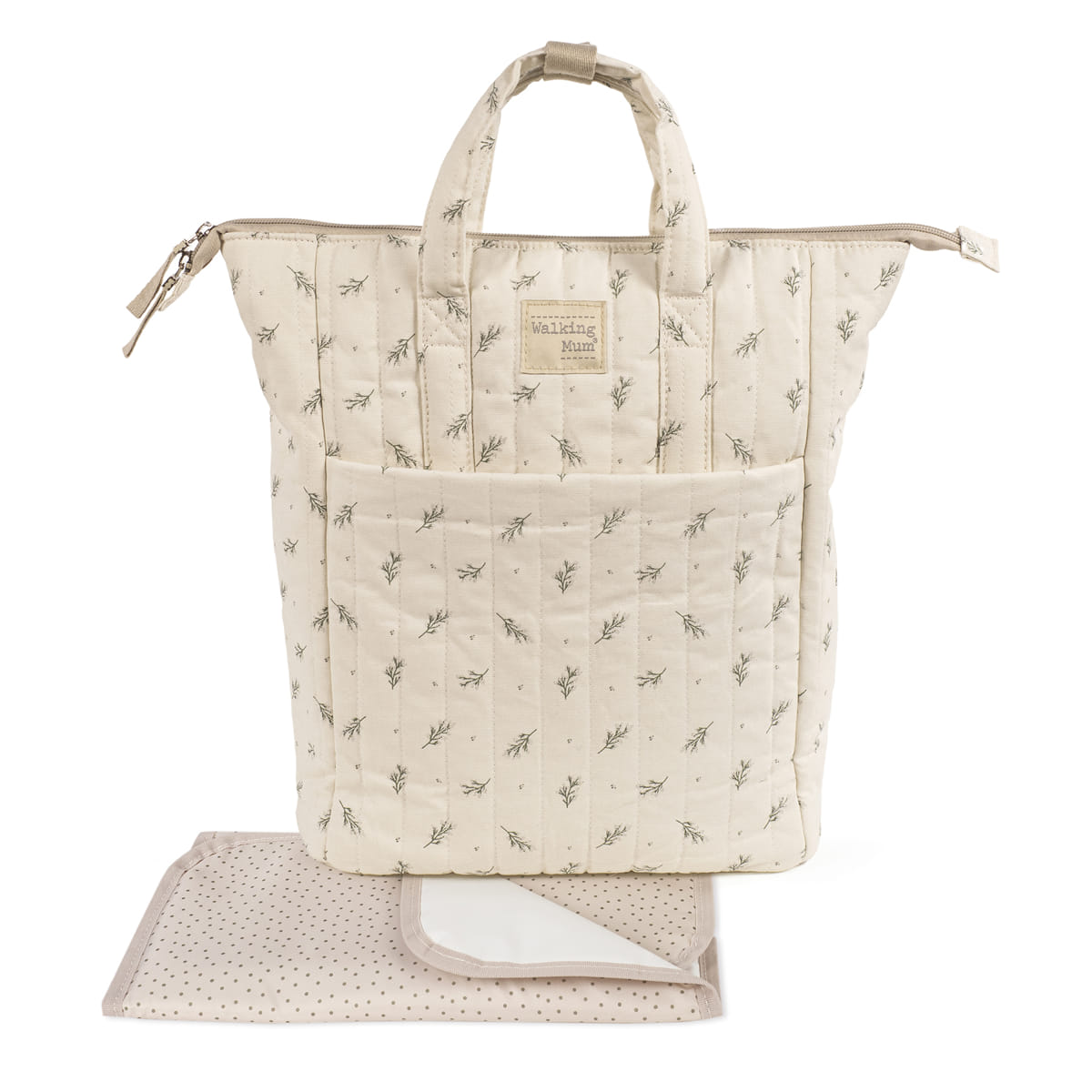 Mochila tecido bege com padrão folhas verdes e muda-fraldas bege pontos castanhos
