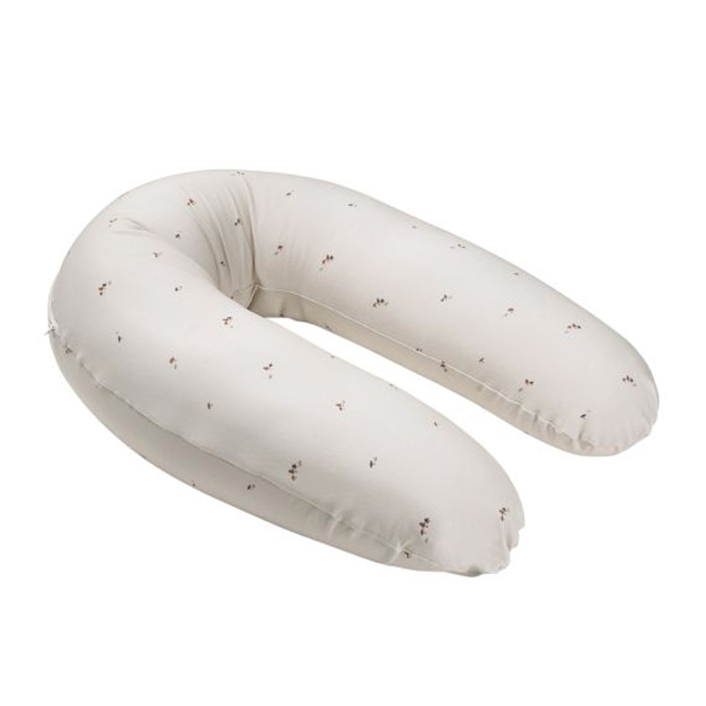almofada de amamentação branca com pequenas flores castanhas e verdes