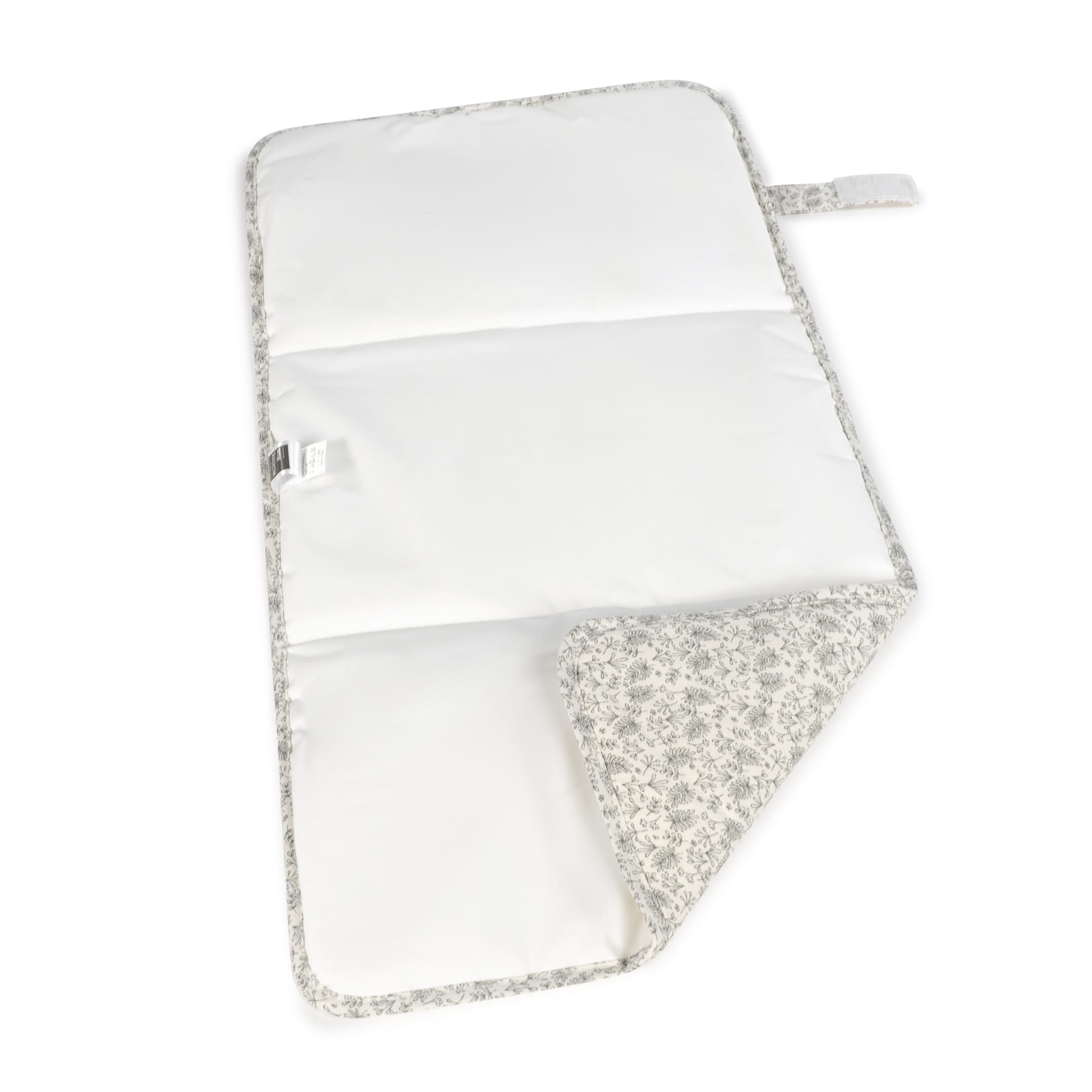 Tapete de mudança branco para bebé com padrão floral cinza nas bordas e aba de velcro