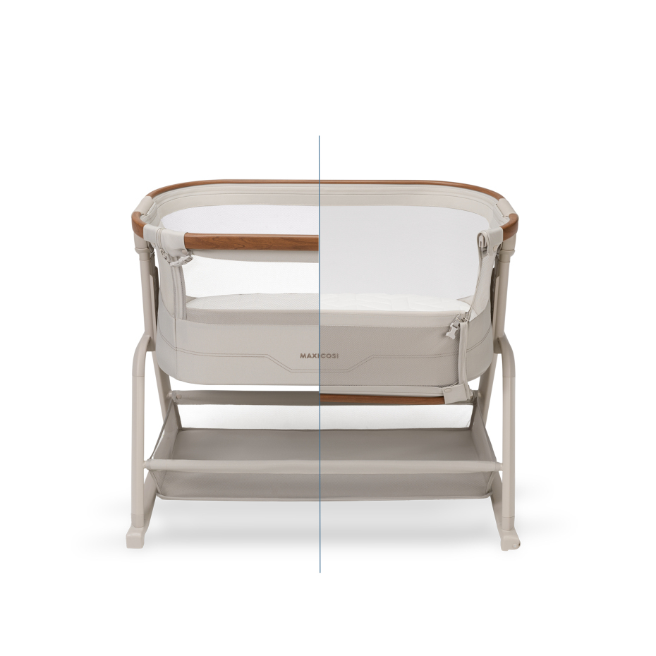 Berço para bebé MAXI-COSI bege com estrutura metálica, detalhes em madeira e rede branca