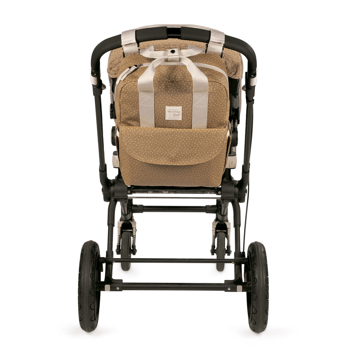Carrinho de bebé castanho claro com padrão de pontos