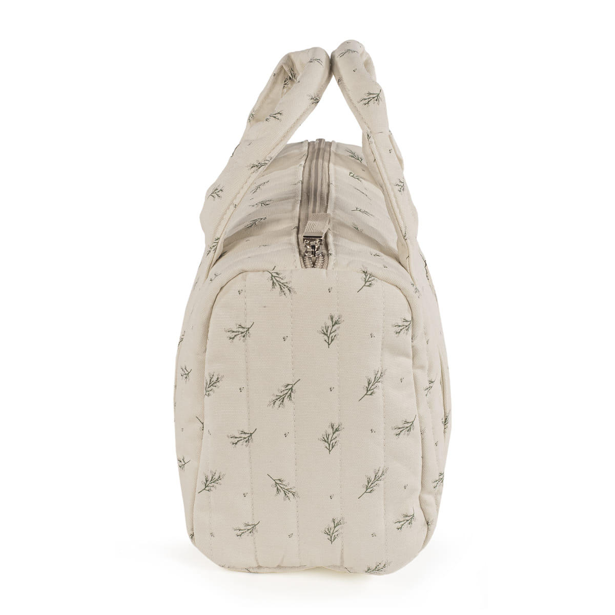 Bolsa bege almofadada com padrão folhas verdes vista lateral