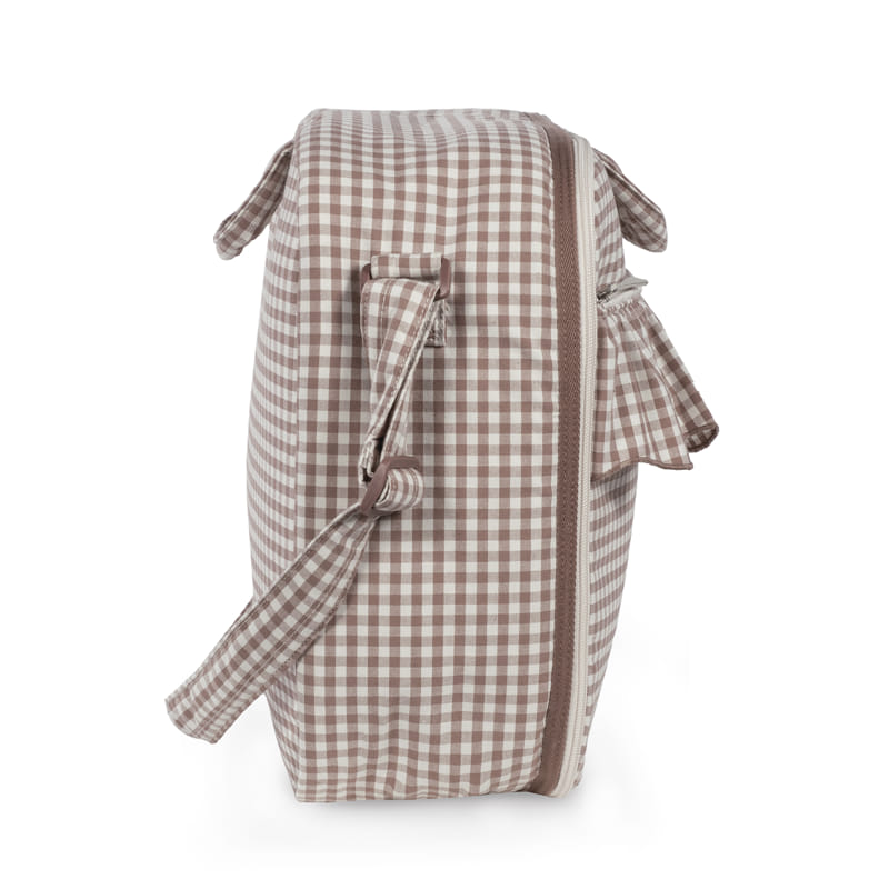 Mala com padrão quadrícula bege e branco vista de lado.