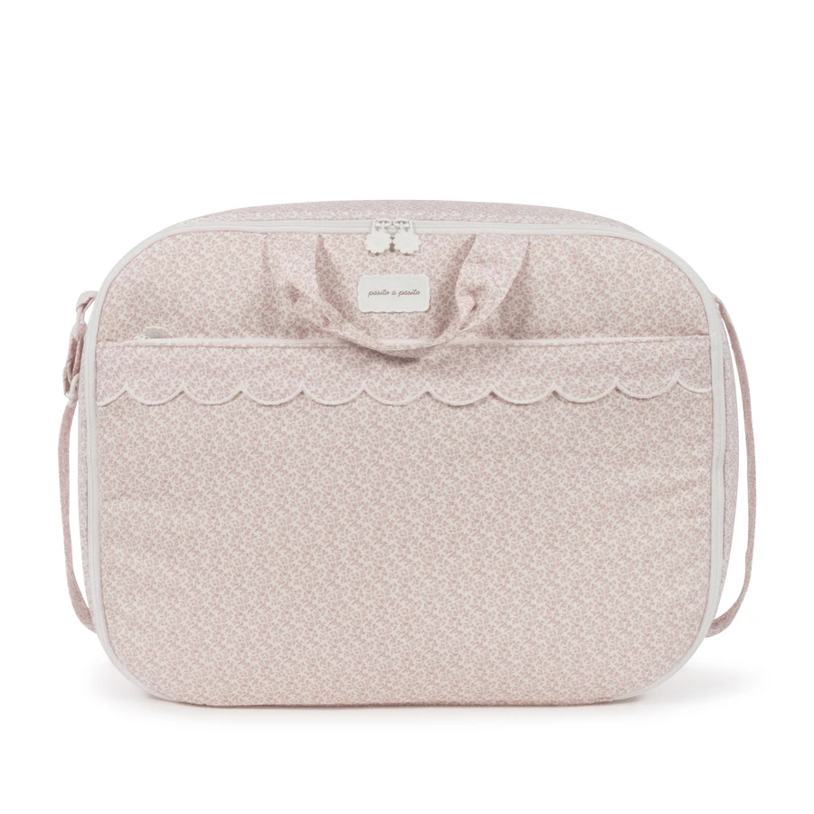 Mala de bebê rosa com padrão floral delicado e fecho de correr branco