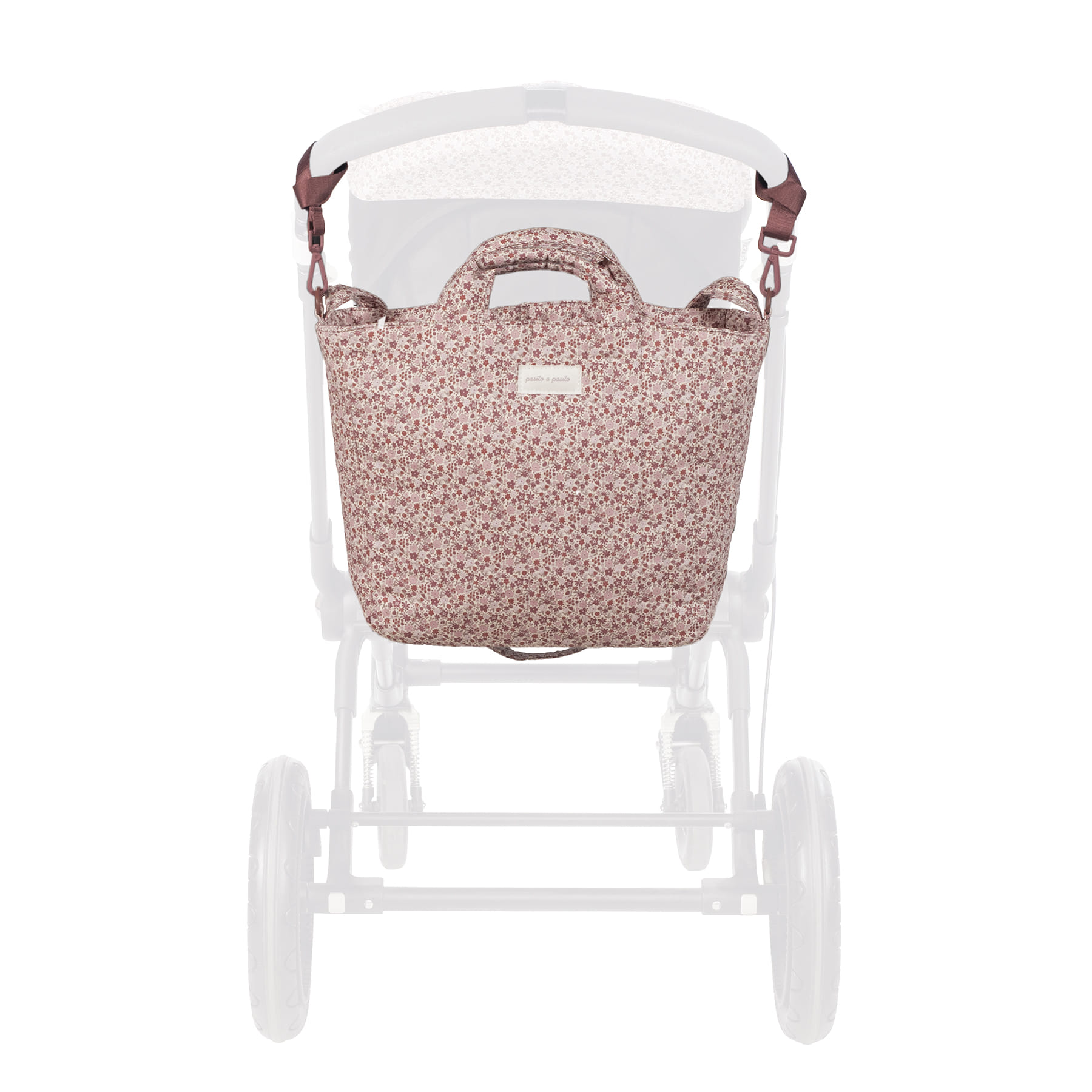 Bolsa floral para carrinho de bebé com etiqueta 'pasito a pasito'.