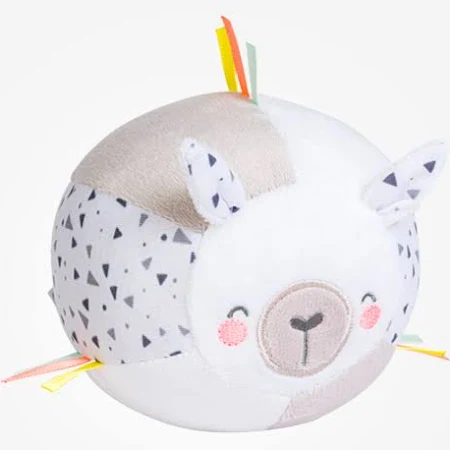 Almofada redonda branca e cinzenta com padrão e rosto de animal sorridente