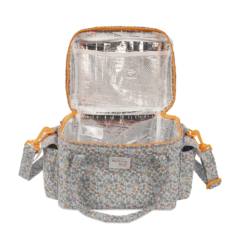 Mala térmica floral com interior isolante prateado aberta