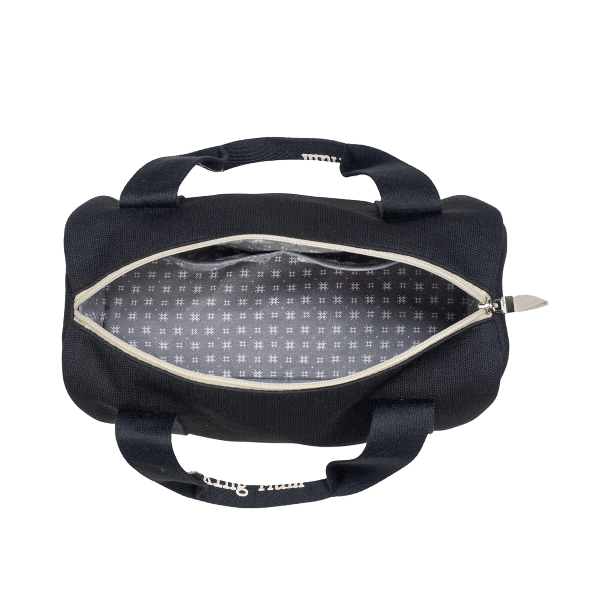 Mala pequena preta com interior padrão e fecho de correr aberto